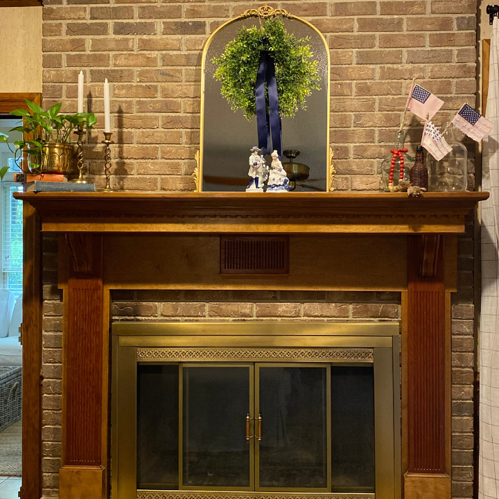 mantle decorated with patriotic decor