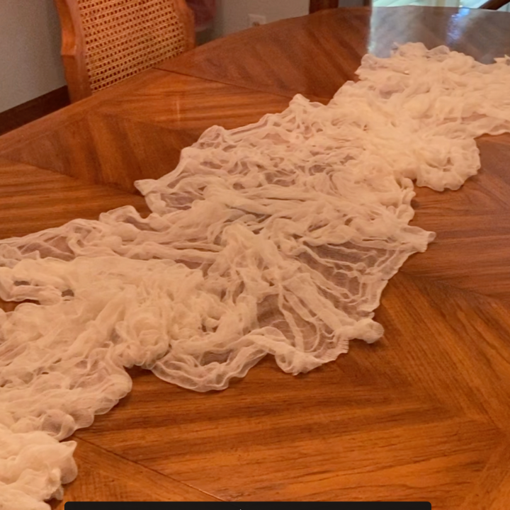 cheesecloth on a table as a runner
