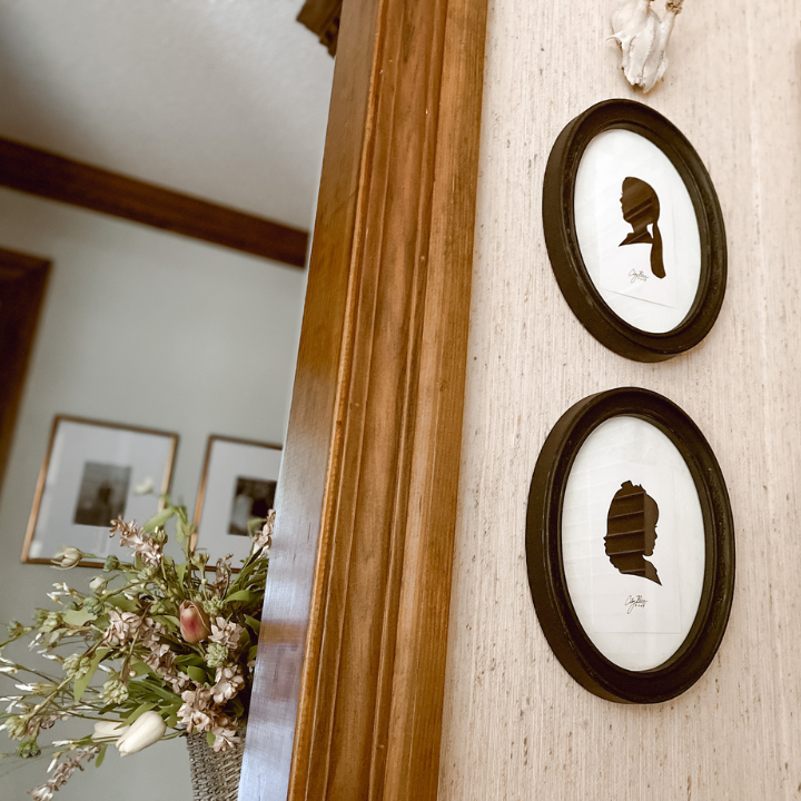 silhouettes hanging in a room